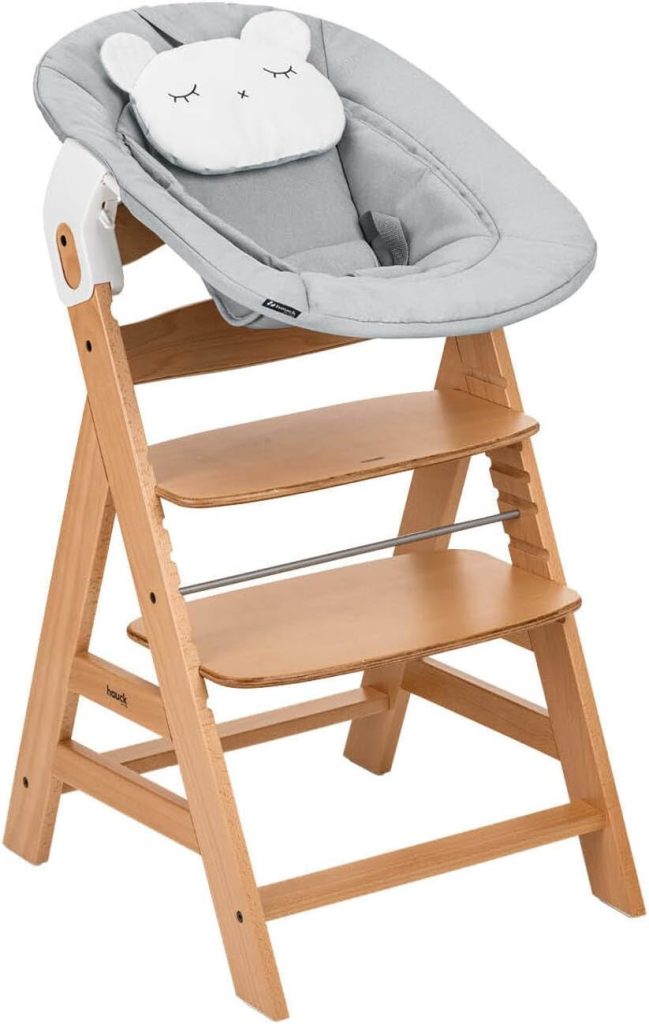La chaise haute transat Alpha Newborn de Hauck comprend un adorable coussin au niveau de la tête de bébé.