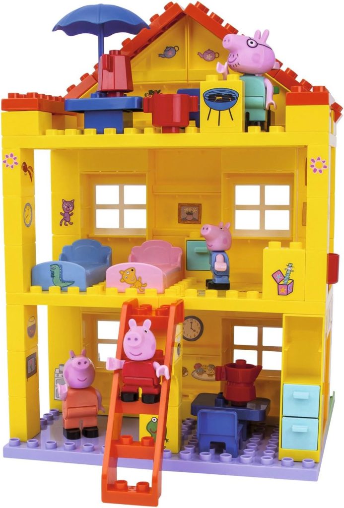 Cette maison Smoby Peppa Pig est jaune, rouge et violet.