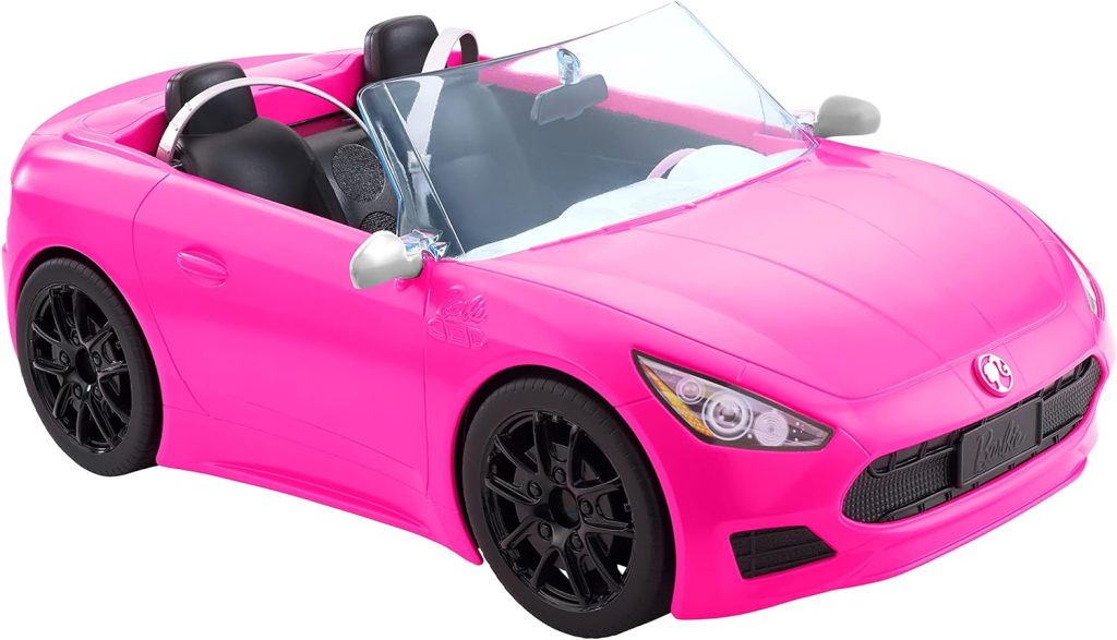 Ce véhicule Barbie est un cabriolet de couleur rose.