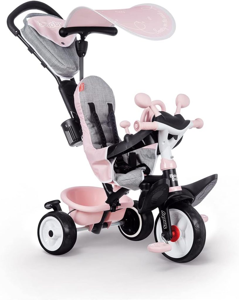 Ce tricycle Smoby Baby Driver Plus est rose.